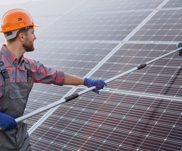 Solar Maintenance and Repairs Perth technician inspecting residential solar panels for optimal performance