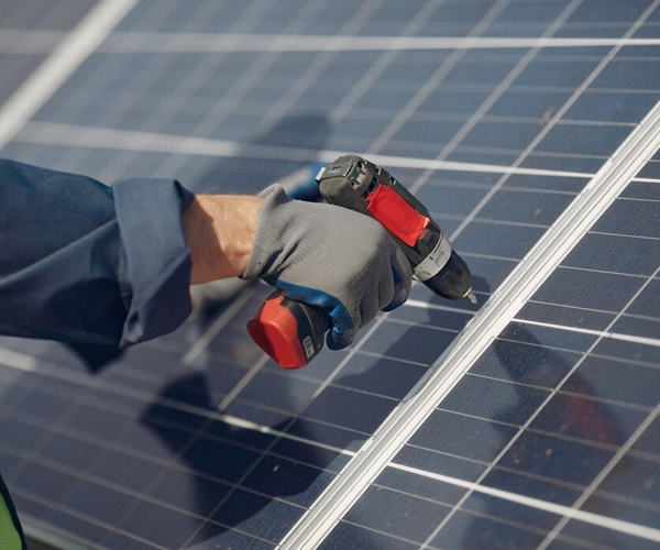 Solar Maintenance and Repairs Perth experts repairing rooftop solar panels and checking system efficiency